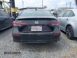 2025 Honda Civic Sport with VIN 2HGFE2F56SH570871, listed as a IAAI auction lot 42014246 with 1,255 mi miles and . Bid and sale history available at DreamBid. Image 17.