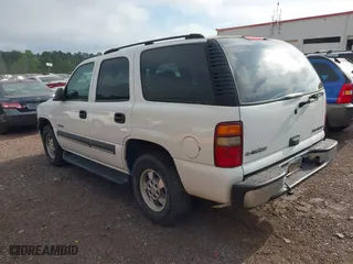 2003 Chevrolet Tahoe LT with VIN 1GNEC13Z13J230763, listed as a IAAI auction lot 42028002 with 201,448 mi miles. Bid and sale history available at carsss.com. Image 3.