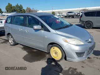 2009 Mazda 5 Sport z VIN JM1CR29L390346326, wystawiony jako IAAI lot #41364845 z przebiegiem 157 700 mil mil oraz . Historia ofert i sprzedaży dostępna na DreamBid. Obrazek 1.