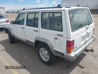 1992 Jeep Cherokee with VIN 1J4FJ58S0NL102716, listed as a IAAI auction lot 42169406 with 197,167 mi miles and . Bid and sale history available at DreamBid. Image 3.