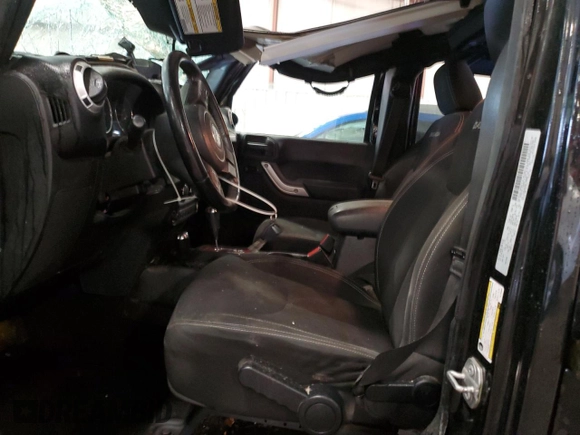 2016 Jeep Wrangler Unlimited Sahara with VIN 1C4BJWEG8GL188869, listed as a Copart auction lot 58128635 with 171,766 mi miles and Clean title. Bid and sale history available at DreamBid. Image 7.