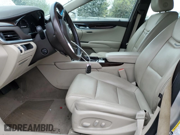 2016 Cadillac XTS Luxury Collection with VIN 2G61N5S31G9194437, listed as a Copart auction lot 56017485 with 75,979 mi miles and Salvage title. Bid and sale history available at DreamBid. Image 7.
