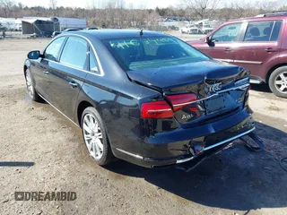 2015 Audi A8 L 4.0T with VIN WAU32AFD1FN021343, listed as a IAAI auction lot 41634469 with 88,229 mi miles. Bid and sale history available at carsss.com. Image 3.