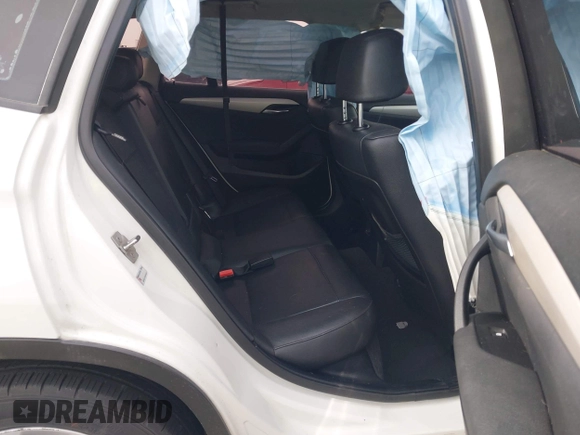 2014 BMW X1 xDrive28i z VIN WBAVL1C54EVY23533, wystawiony jako IAAI lot #41949759 z przebiegiem Nie podano mil oraz . Historia ofert i sprzedaży dostępna na DreamBid. Obrazek 8.