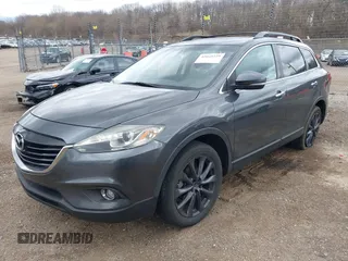 2015 Mazda CX-9 Grand Touring with VIN JM3TB3DV1F0465966, listed as a IAAI auction lot 42049749 with 74,470 mi miles and . Bid and sale history available at DreamBid. Image 17.