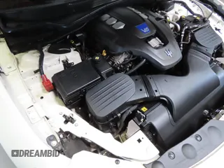 2014 Maserati Ghibli S Q4 z VIN ZAM57RTA7E1094580, wystawiony jako Copart lot #52009445 z przebiegiem 79 463 mil mil oraz Szkoda całkowita • Salvage title. Historia ofert i sprzedaży dostępna na DreamBid. Obrazek 7.