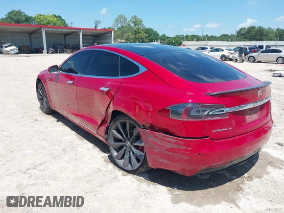 2016 Tesla Model S 90D with VIN 5YJSA1E48GF144821, listed as a IAAI auction lot 42206473 with 129,624 mi miles and . Bid and sale history available at DreamBid. Image 3.