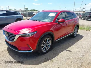 2017 Mazda CX-9 Grand Touring z VIN JM3TCADY3H0140895, wystawiony jako IAAI lot #42817948 z przebiegiem 125 288 mil mil oraz . Historia ofert i sprzedaży dostępna na DreamBid. Obrazek 17.