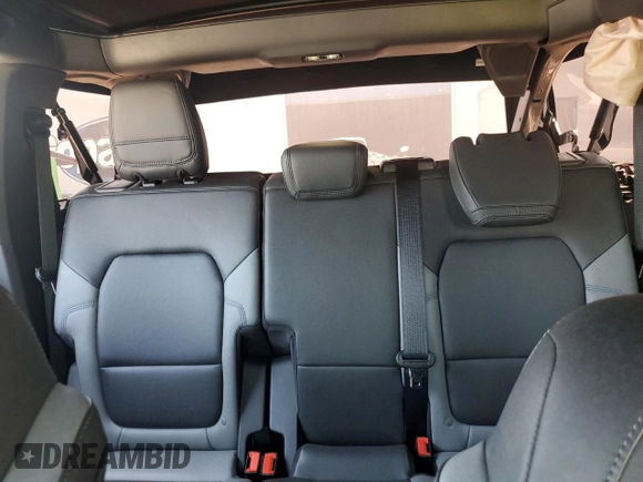 2023 Ford Bronco с VIN 1FMEE5DH2PLB21489, выставлен на аукционе Copart как лот 60690365 с пробегом 14 326 миль миль и Списание • Salvage title. История ставок и продаж доступна на DreamBid. Изображение 10.