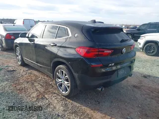 2020 BMW X2 xDrive28i with VIN WBXYJ1C02L5P31038, listed as a IAAI auction lot 41338219 with 72,854 mi miles. Bid and sale history available at carsss.com. Image 3.
