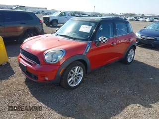 2013 MINI Countryman S z VIN WMWZC3C52DWP23887, wystawiony jako IAAI lot #42278143 z przebiegiem 63 625 mil mil oraz . Historia ofert i sprzedaży dostępna na DreamBid. Obrazek 2.