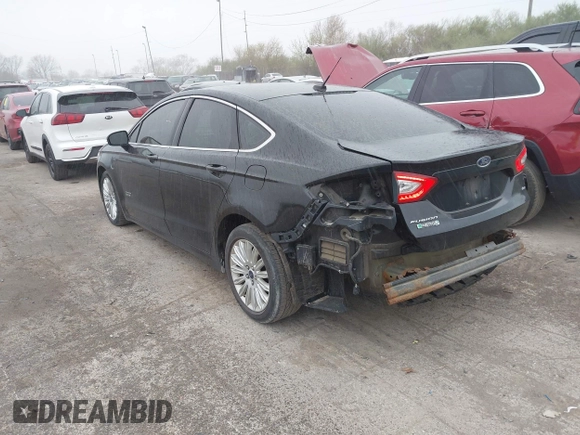 2016 Ford Fusion Energi SE Luxury with VIN 3FA6P0PU2GR322430, listed as a IAAI auction lot 42038508 with 114,980 mi miles. Bid and sale history available at carsss.com. Image 3.