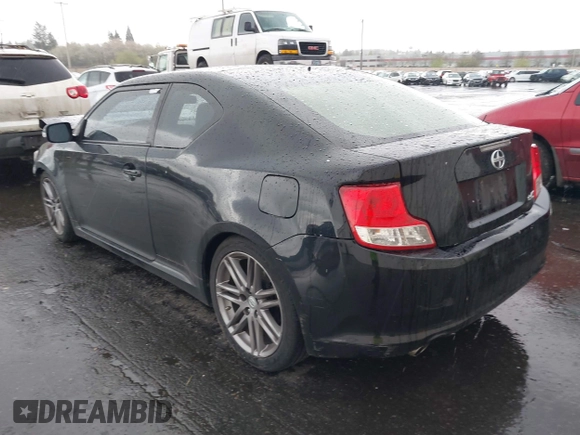 2013 Scion tC with VIN JTKJF5C74D3065648, listed as a IAAI auction lot 41974509 with 97,669 mi miles. Bid and sale history available at carsss.com. Image 3.
