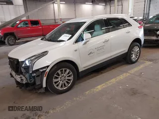 2017 Cadillac XT5 FWD with VIN 1GYKNARS7HZ121596, listed as a IAAI auction lot 41825879 with 82,023 mi miles and . Bid and sale history available at DreamBid. Image 2.