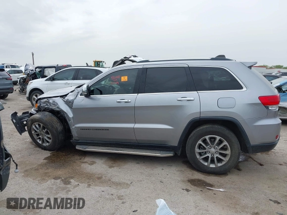 2015 Jeep Grand Cherokee Limited with VIN 1C4RJFBG4FC705392, listed as a IAAI auction lot 41946396 with 1 mi miles. Bid and sale history available at carsss.com. Image 14.