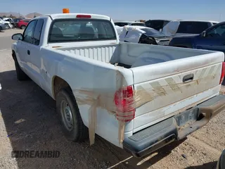 2002 Dodge Dakota with VIN 1B7GL12X32S701273, listed as a IAAI auction lot 41552573 with 157,212 mi miles and . Bid and sale history available at carsss.com. Image 3.