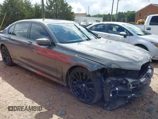 2020 BMW 7 Series 740i z VIN WBA7T2C0XLGF96842, wystawiony jako IAAI lot #42230866 z przebiegiem 60 664 mil mil oraz . Historia ofert i sprzedaży dostępna na DreamBid. Obrazek 1.