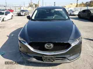 2021 Mazda CX-5 Touring with VIN JM3KFBCM8M0495899, listed as a Copart auction lot 51049235 with 31,164 mi miles and Salvage Title. Bid and sale history available at carsss.com. Image 11.