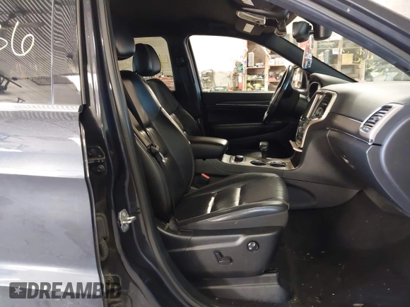 2015 Jeep Grand Cherokee Limited with VIN 1C4RJFBG5FC941811, listed as a IAAI auction lot 41003336 with 137,867 mi miles. Bid and sale history available at carsss.com. Image 5.
