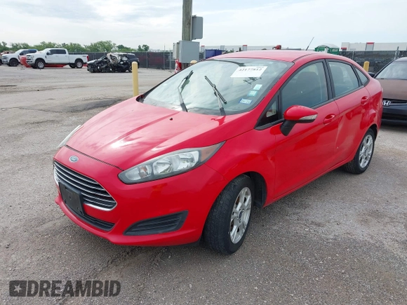 2015 Ford Fiesta SE with VIN 3FADP4BJ9FM129246, listed as a IAAI auction lot 42177812 with 87,925 mi miles. Bid and sale history available at carsss.com. Image 2.