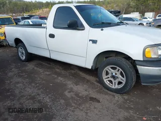 2000 Ford F-150 XL with VIN 1FTRF17W3YNA55157, listed as a IAAI auction lot 41467920 with Not provided miles and . Bid and sale history available at DreamBid. Image 1.