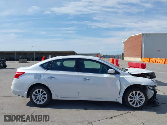 2018 Nissan Sentra SV z VIN 3N1AB7AP8JY259106, wystawiony jako IAAI lot #41899218 z przebiegiem 88 750 mil mil oraz . Historia ofert i sprzedaży dostępna na DreamBid. Obrazek 14.