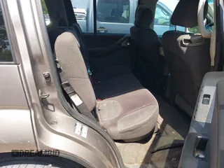 2006 Nissan Pathfinder SE with VIN 5N1AR18U46C670001, listed as a IAAI auction lot 42451015 with 292,292 mi miles and . Bid and sale history available at DreamBid. Image 8.