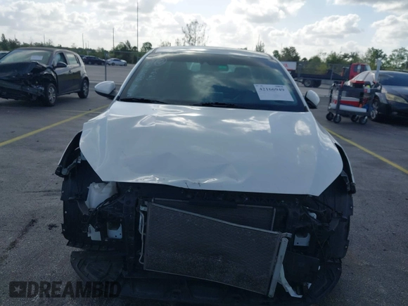 2021 Kia Forte FE with VIN 3KPF24AD7ME349327, listed as a IAAI auction lot 42166949 with 71,217 mi miles and . Bid and sale history available at DreamBid. Image 13.