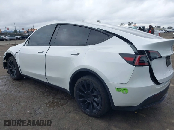 2023 Tesla Model Y Long Range with VIN 7SAYGDEE1PA106057, listed as a IAAI auction lot 41778642 with 1 mi miles. Bid and sale history available at carsss.com. Image 3.