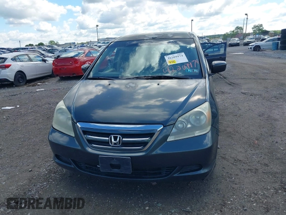 2005 Honda Odyssey LX with VIN 5FNRL38205B128740, listed as a IAAI auction lot 42209974 with 183,014 mi miles and . Bid and sale history available at DreamBid. Image 12.