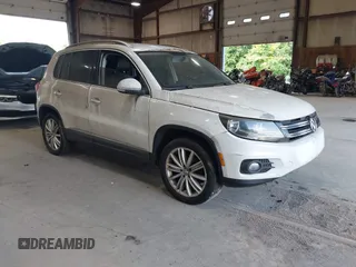 2012 Volkswagen Tiguan SE with VIN WVGAV7AXXCW533237, listed as a IAAI auction lot 42670923 with 227,323 mi miles and . Bid and sale history available at DreamBid. Image 1.