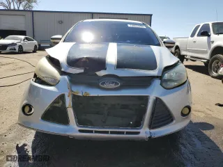 2014 Ford Focus SE with VIN 1FADP3K22EL169090, listed as a Copart auction lot 74069884 with 101,881 mi miles and Salvage Title. Bid and sale history available at carsss.com. Image 5.