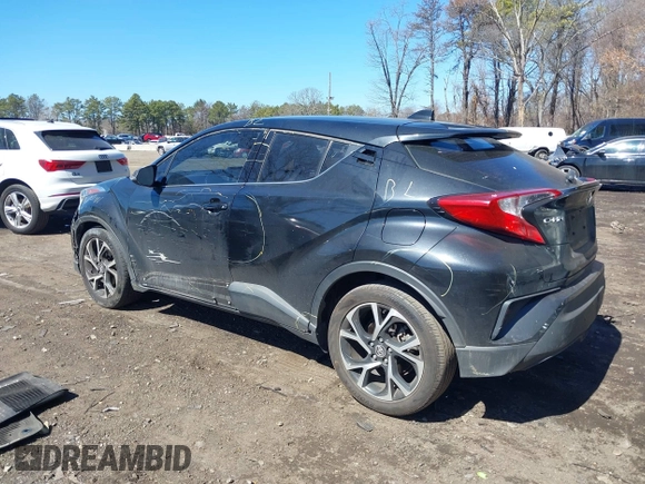 2019 Toyota C-HR XLE with VIN JTNKHMBXXK1019814, listed as a IAAI auction lot 41884485 with 53,101 mi miles. Bid and sale history available at carsss.com. Image 14.
