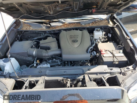 2023 Toyota Tacoma SR with VIN 3TMCZ5AN3PM571922, listed as a Copart auction lot 61872775 with 34,501 mi miles and Salvage title. Bid and sale history available at DreamBid. Image 11.