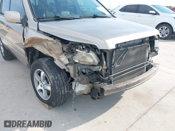 2006 Honda Pilot EX-L with VIN 5FNYF18586B028291, listed as a IAAI auction lot 42040904 with 217,038 mi miles and . Bid and sale history available at carsss.com. Image 6.