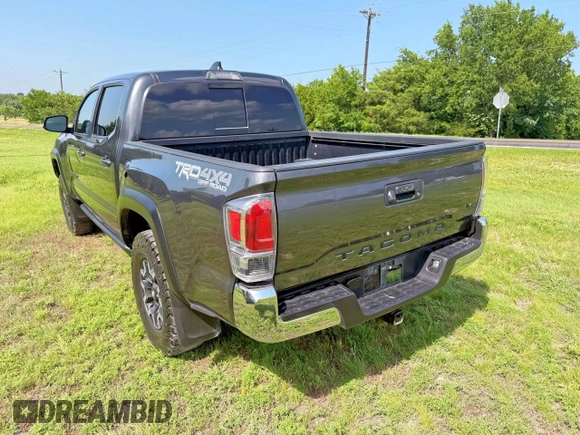 2021 Toyota Tacoma SR с VIN 3TMCZ5AN3MM441215, выставлен на аукционе Copart как лот 64744385 с пробегом 30 503 миль миль и Списание • Salvage title. История ставок и продаж доступна на DreamBid. Изображение 3.