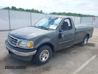 2002 Ford F-150 XL with VIN 1FTRF17W22NA77707, listed as a IAAI auction lot 42291542 with Not provided miles and . Bid and sale history available at DreamBid. Image 2.