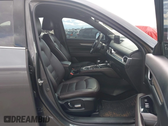 2023 Mazda CX-5 Signature with VIN JM3KFBXY9P0102087, listed as a IAAI auction lot 41771949 with 35,610 mi miles and . Bid and sale history available at carsss.com. Image 5.