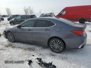 2018 Acura TLX Technology z VIN 19UUB3F5XJA802956, wystawiony jako Copart lot #46687825 z przebiegiem Nie podano mil oraz Szkoda całkowita • Salvage title. Historia ofert i sprzedaży dostępna na DreamBid. Obrazek 2.