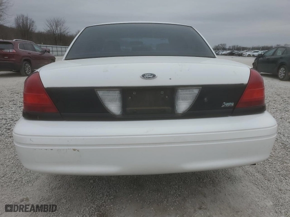 2010 Ford Police Interceptor with VIN 2FABP7BV6AX125342, listed as a Copart auction lot 44036775 with 129,661 mi miles and Salvage Title. Bid and sale history available at carsss.com. Image 6.