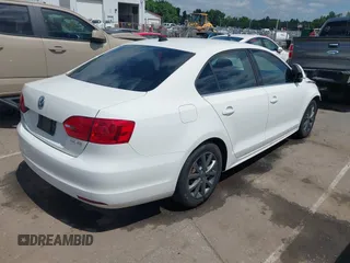 2013 Volkswagen Jetta SE with VIN 3VWDX7AJ1DM319114, listed as a IAAI auction lot 42295095 with 164,583 mi miles and . Bid and sale history available at DreamBid. Image 4.