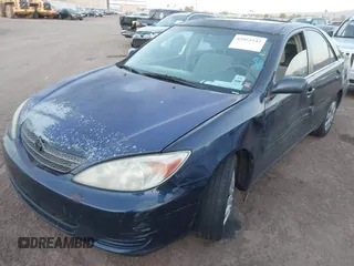 2004 Toyota Camry LE with VIN 4T1BE32K54U260916, listed as a IAAI auction lot 42052542 with 260,721 mi miles and . Bid and sale history available at carsss.com. Image 2.