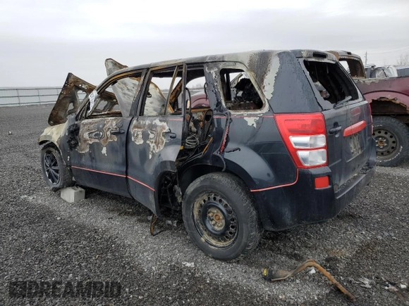 2013 Suzuki Grand Vitara Premium z VIN JS3TD0D63D4100688, wystawiony jako Copart lot #52875645 z przebiegiem Nie podano mil oraz Nie do naprawy • Non repairable. Historia ofert i sprzedaży dostępna na DreamBid. Obrazek 2.