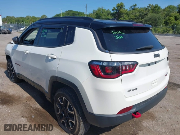 2021 Jeep Compass Trailhawk with VIN 3C4NJDDB7MT564467, listed as a IAAI auction lot 42330939 with 76,963 mi miles and . Bid and sale history available at DreamBid. Image 3.