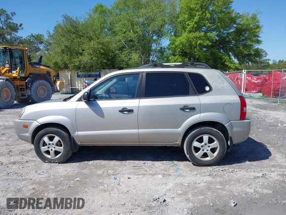 2006 Hyundai Tucson GL with VIN KM8JM12BX6U249982, listed as a IAAI auction lot 41976033 with 107,153 mi miles. Bid and sale history available at carsss.com. Image 14.