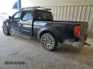 2009 Nissan Frontier LE with VIN 1N6AD09U79C409698, listed as a Copart auction lot 55843545 with 230,334 mi miles and Salvage title. Bid and sale history available at DreamBid. Image 2.