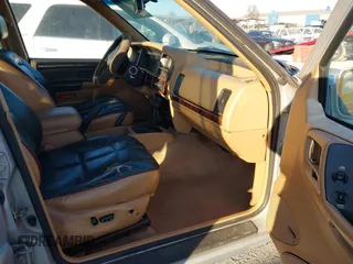 1997 Jeep Grand Cherokee Limited with VIN 1J4GZ78Y8VC718435, listed as a IAAI auction lot 41405361 with 210,599 mi miles. Bid and sale history available at carsss.com. Image 5.