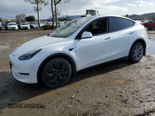 2023 Tesla Model Y Long Range with VIN 7SAYGDEEXPF844622, listed as a Copart auction lot 49094465 with 35,191 mi miles and Salvage Title. Bid and sale history available at DreamBid. Image 1.