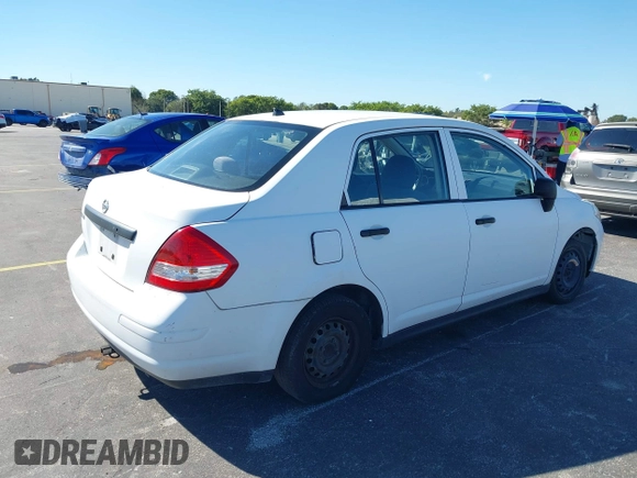 2010 Nissan Versa 1.6 with VIN 3N1CC1AP2AL377412, listed as a IAAI auction lot 41420948 with 127,643 mi miles. Bid and sale history available at carsss.com. Image 4.