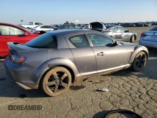 2006 Mazda RX-8 with VIN JM1FE173060201519, listed as a Copart auction lot 88363445 with 150,570 mi miles and Salvage Title. Bid and sale history available at carsss.com. Image 3.